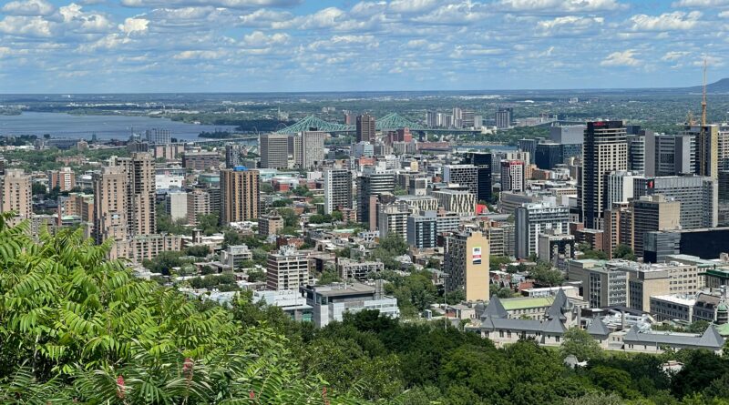 things to do in Montreal Quebec showing the historic Old Port waterfront with the Notre-Dame Basilica illuminated at night and the St Lawrence River representing the top attractions and city sights in Montreal Canada