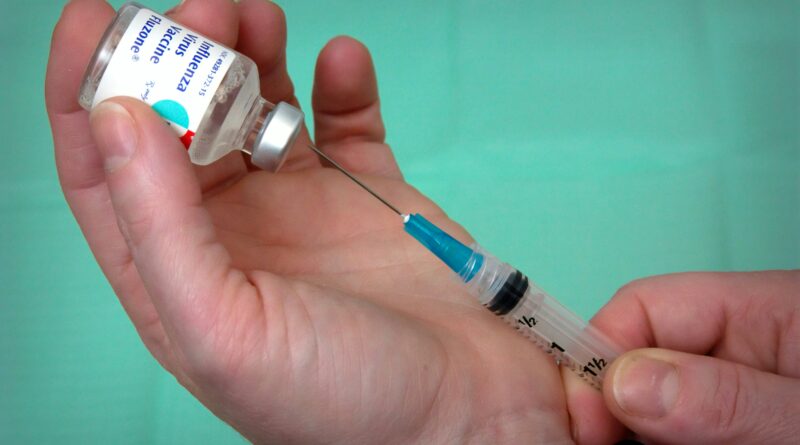 shingles vaccine cost showing a Shingrix vaccine vial representing shingles vaccine UK cost NHS eligibility private shingrix price and where to get the shingles vaccine