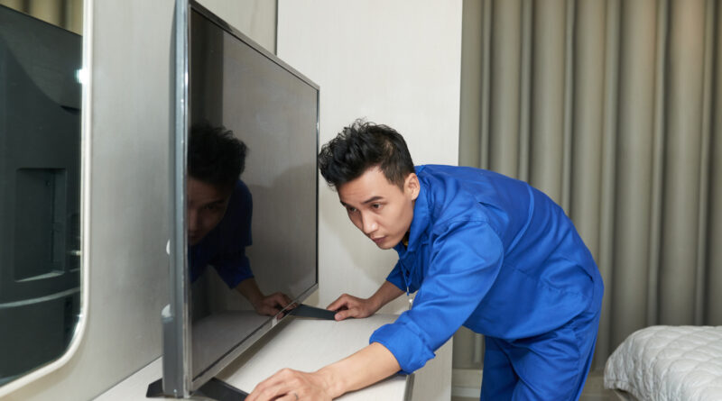 bad tv reception showing a pixelated television screen representing bad TV reception UK causes poor signal fixes aerial problems interference how to fix Freeview reception and when to call a TV aerial engineer