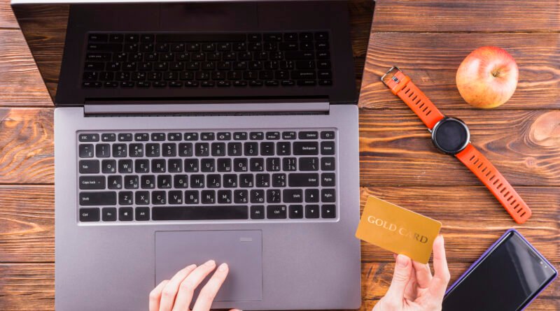 MacBook on finance UK showing a MacBook Air with a payment plan on screen representing MacBook pay monthly 0 percent APR interest free and EE MacBook finance options UK 2026